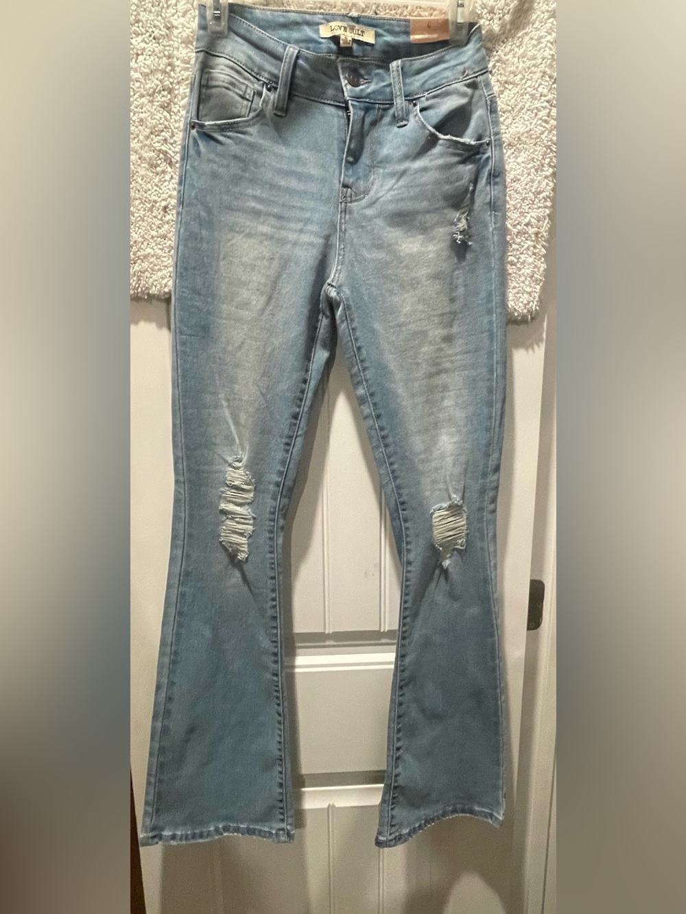 Light Blue Distressed Flare Jeans by Love Cult